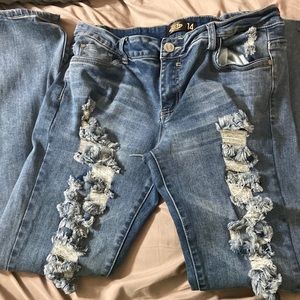 Distressed womens jeans